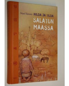 Kirjailijan Mari Tammi käytetty kirja Hilda ja Tilda Salatun maassa