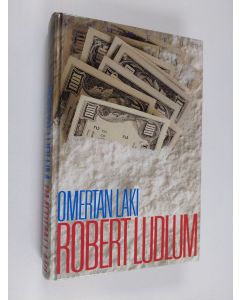 Kirjailijan Robert Ludlum käytetty kirja Omertan laki