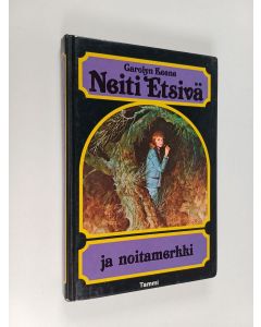 Kirjailijan Carolyn Keene käytetty kirja Neiti Etsivä ja noitamerkki