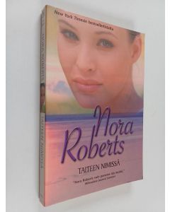 Kirjailijan Nora Roberts käytetty kirja Taiteen nimissä