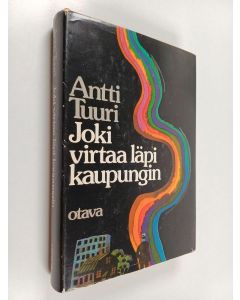 Kirjailijan Antti Tuuri käytetty kirja Joki virtaa läpi kaupungin