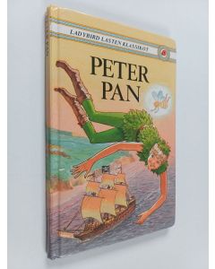 Kirjailijan J. M. Barrie käytetty kirja Peter Pan