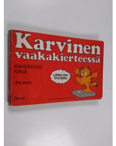 Kirjailijan Jim Davis käytetty kirja Karvinen vaakakierteessä