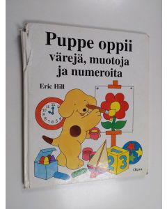 Kirjailijan Eric Hill käytetty kirja Puppe oppii värejä, muotoja ja numeroita