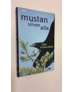 Kirjailijan Kari Kovalainen käytetty kirja Mustan siiven alla (ERINOMAINEN)