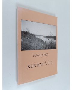 Kirjailijan Uuno Sykkö käytetty kirja Kun kylä eli