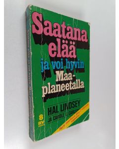 Kirjailijan Hal Lindsey & C. C. Carlson käytetty kirja Saatana elää ja voi hyvin Maa-planeetalla