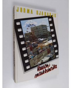 Kirjailijan Jorma Ojaharju käytetty kirja Vaasan markkinoilla : lapsuuden ja nuoruuden kuvakirja