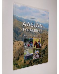 Kirjailijan Pertti Uotila käytetty kirja Aasian sydämessä : retki Kirgisiaan kesällä 2009