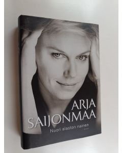 Kirjailijan Arja Saijonmaa käytetty kirja Nuori alaston nainen : Mikis ja minä