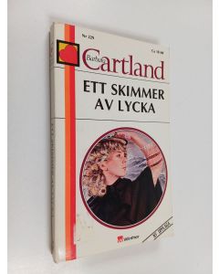 Kirjailijan Barbara Cartland käytetty kirja Ett skimmer av lycka