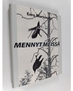 Kirjailijan Eero Murtomäki käytetty kirja Mennyt meissä : tarinoita mereltä, metsistä ja tuntureilta