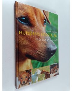 Kirjailijan Charlotte Swanstein käytetty kirja Hundens första år : från valp till unghund