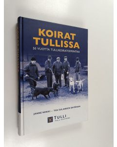 Kirjailijan Janne Nokki käytetty kirja Koirat Tullissa : 50 vuotta tullikoiratoimintaa