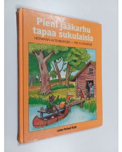 Kirjailijan Hermann Altenburger käytetty kirja Pieni jääkarhu tapaa sukulaisia