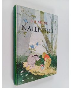Kirjailijan A. A. Milne käytetty kirja Nalle Puh ; Nalle Puh rakentaa talon