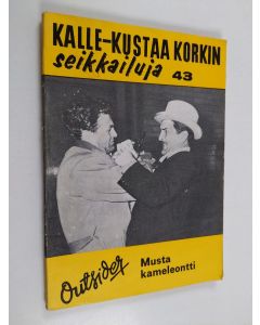 Kirjailijan Outsider käytetty kirja Musta kameleontti