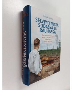 Kirjailijan Jussi Meriluoto käytetty kirja Selviytymistä sodassa ja rauhassa : murrosvuosien historiaa ja Veikko ja Elma Meriluodon elämänvaiheita vuosina 1930–1955