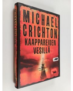 Kirjailijan Michael Crichton käytetty kirja Kaappareiden vesillä