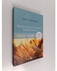 Kirjailijan Jon Kabat-Zinn käytetty kirja Kutsu tietoisen läsnäolon harjoittamiseen