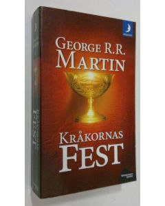 Kirjailijan George R. R. Martin käytetty kirja Kråkornas Fest