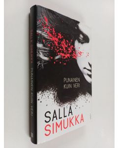 Kirjailijan Salla Simukka käytetty kirja Punainen kuin veri