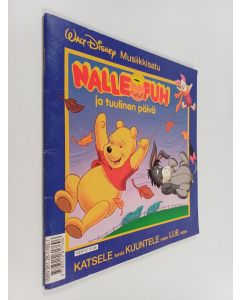 Kirjailijan Walt Disney käytetty teos Nalle Puh ja tuulinen päivä