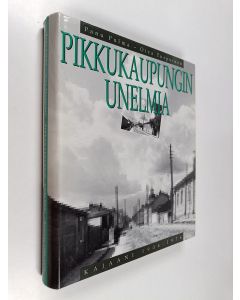 Kirjailijan Panu Pulma käytetty kirja Pikkukaupungin unelmia : Kajaani 1906-1976