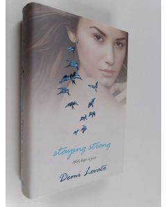 Kirjailijan Demi Lovato käytetty kirja Staying Strong