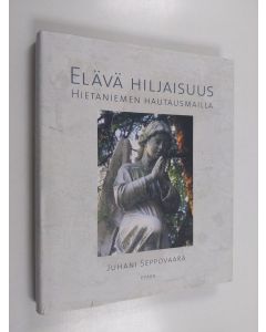 Kirjailijan Juhani Seppovaara käytetty kirja Elävä hiljaisuus Hietaniemen hautausmailla