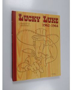 Kirjailijan Morris käytetty kirja Lucky Luke 1962-1964 : Vankkurikaravaani ; Aavekaupunki ; Daltonit tekevät parannuksen