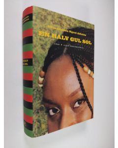 Kirjailijan Chimamanda Ngozi Adichie käytetty kirja En halv gul sol (UUDENVEROINEN)