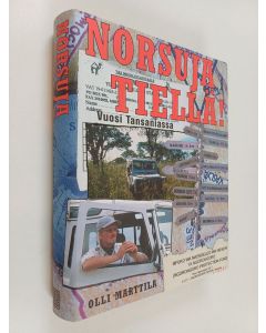 Kirjailijan Olli Marttila käytetty kirja Norsuja tiellä! : vuosi Tansaniassa