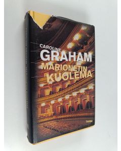 Kirjailijan Caroline Graham käytetty kirja Marionetin kuolema