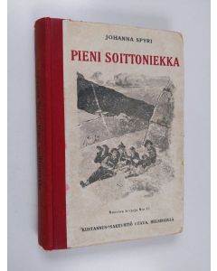 Kirjailijan Johanna Spyri käytetty kirja Pieni soittoniekka - kertomus Alpeilta