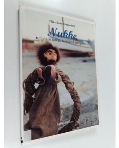 Kirjailijan Elina Taras-Vaulasvirta käytetty kirja Nukke : tunteiden tulkki, kertojan kumppani