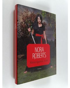 Kirjailijan Nora Roberts käytetty kirja Morriganin risti