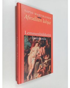 Kirjailijan Tapio Martikainen käytetty kirja Afroditen lahjat : lemmenlääkkeitä luonnosta