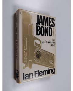 Kirjailijan Ian Fleming käytetty kirja James Bond ja kultainen ase : jännitysromaani