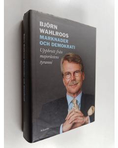 Kirjailijan Björn Wahlroos käytetty kirja Marknader och demokrati : uppbrott från majoritetens tyranni
