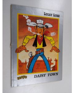 Kirjailijan Edita Morris käytetty kirja Daisy Town : Goscinnyn & Morrisin suuren piirroselokuvan mukaan