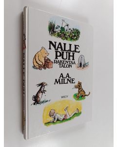 Kirjailijan A. A. Milne käytetty kirja Nalle Puh rakentaa talon