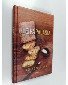 Kirjailijan Ari Korolainen käytetty kirja Leipäpalasia