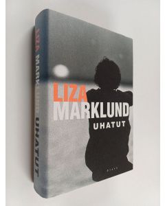 Kirjailijan Liza Marklund käytetty kirja Uhatut