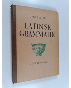 Kirjailijan Ivar A. Heikel käytetty kirja Latinsk grammatik