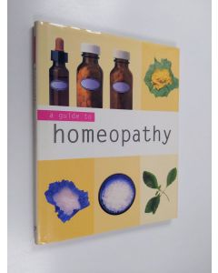 Kirjailijan Andrew James käytetty kirja A Guide to Homeopathy