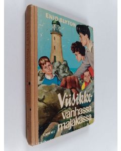 Kirjailijan Enid Blyton käytetty kirja Viisikko vanhassa majakassa