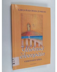 Kirjailijan Lari ja Kaija Maria Junkkari käytetty kirja Yhdessä eteenpäin : kuulutusparin kirja