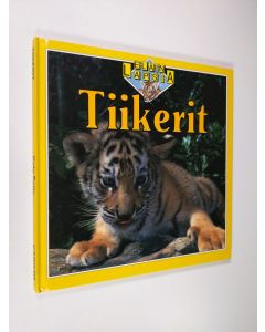 Kirjailijan Kate Petty käytetty kirja Tiikerit