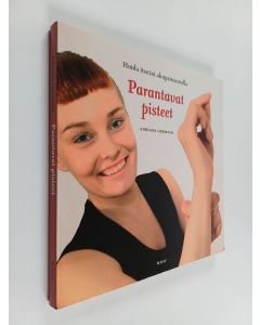 Kirjailijan Adriana Germain käytetty kirja Parantavat pisteet : hoida itseäsi akupainannalla